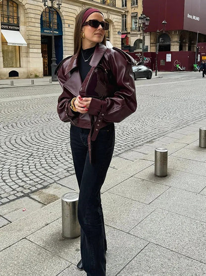 Leather jacket with elegant belt