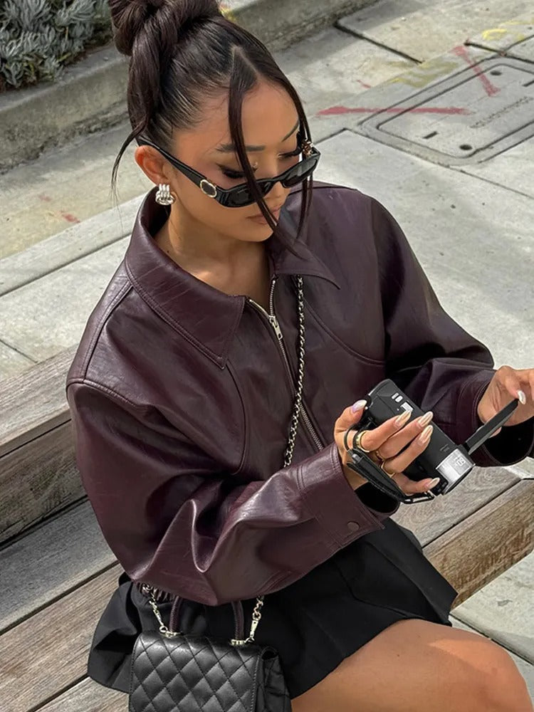 Leather jacket with elegant belt