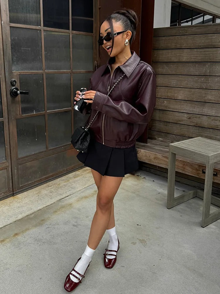 Leather jacket with elegant belt
