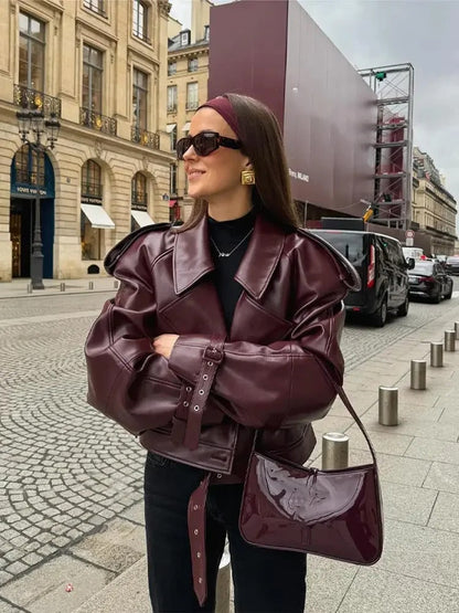 Leather jacket with elegant belt