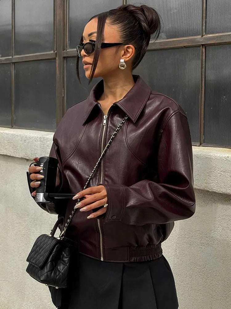 Leather jacket with elegant belt