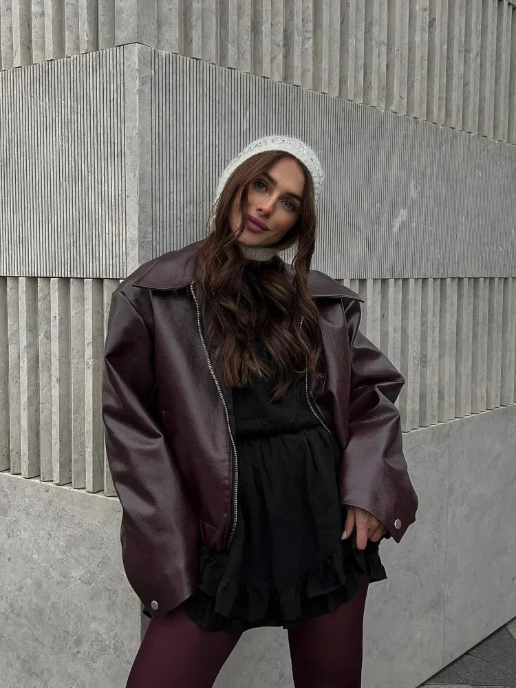 Leather jacket with elegant belt